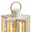Close-up of the Starlight lantern's cream star-shaped top and metal hanging handle.