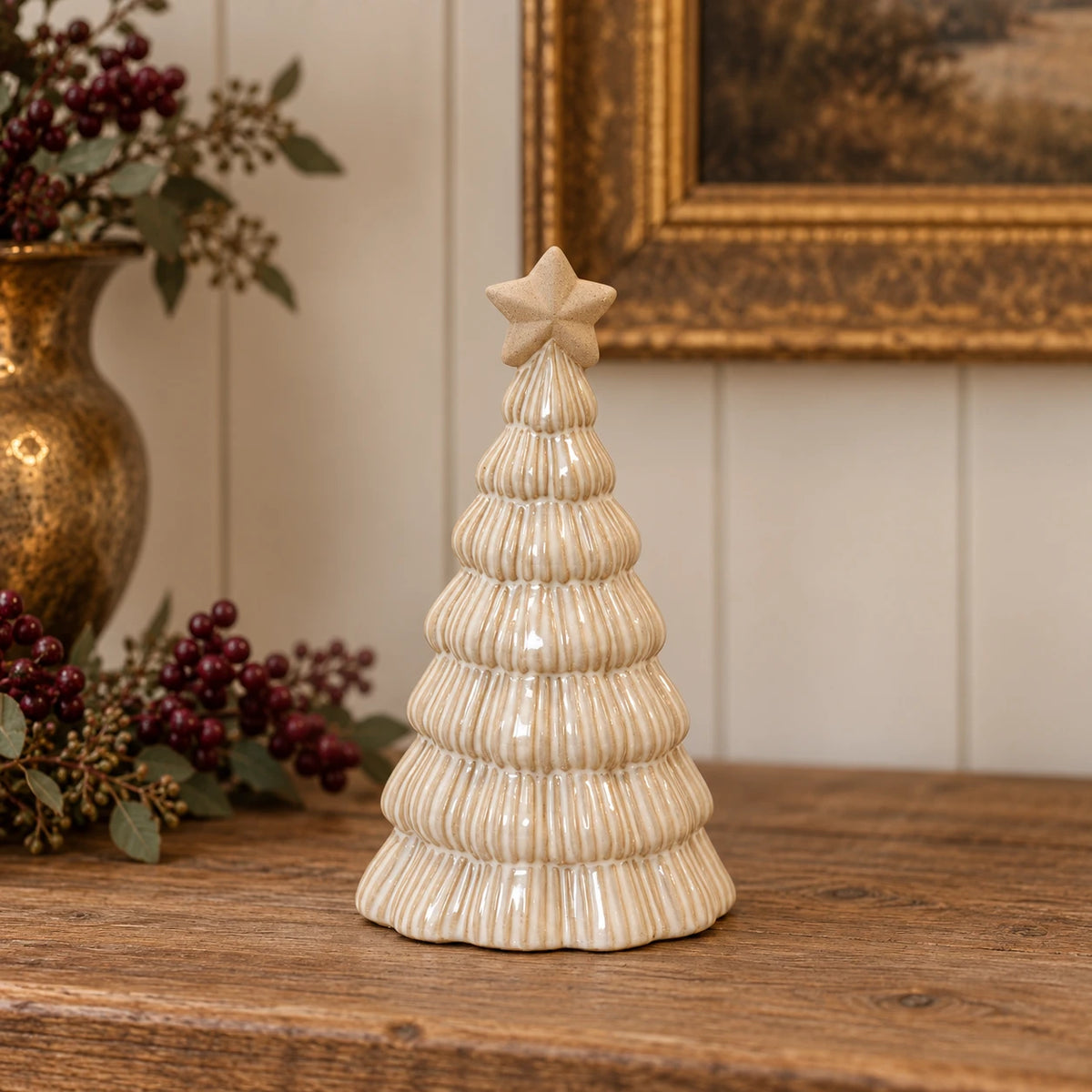 Ribbed ceramic Christmas tree on an oak console with burgundy accents