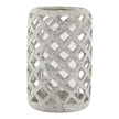 Stone lattice hurricane lantern for home decor by Hill Interiors, featuring a textured stone exterior and glass interior for ambient lighting.