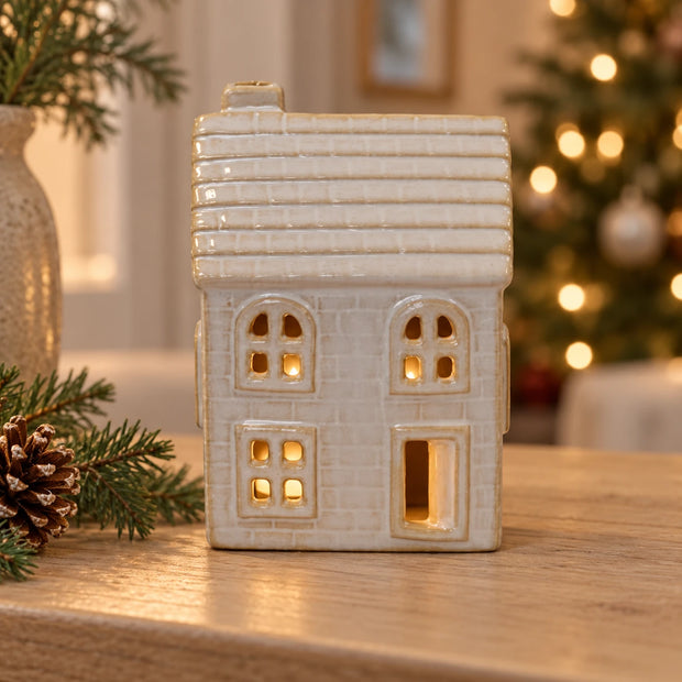Stoneglazed ceramic LED Christmas house ornament by Satchville, featuring traditional holiday design and warm glowing lights.