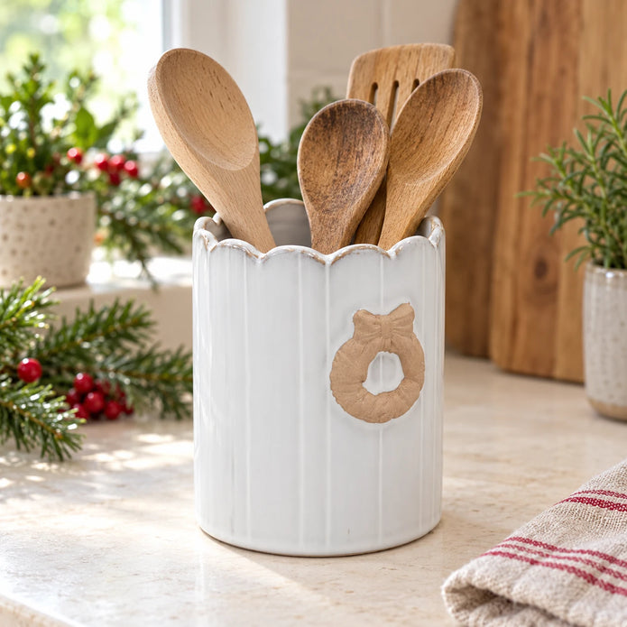 Stoneglazed Christmas wreath pot holding wooden kitchen utensils