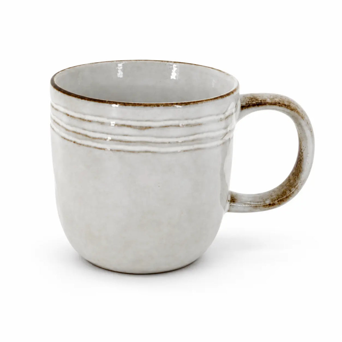 Single empty stoneware coffee mug with brown rim and curved handle on white