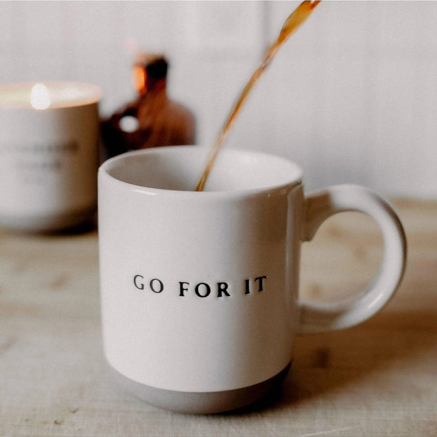 Cream glazed ceramic mug by Sweet Water Decor, 14oz, featuring motivational "Go For It" text, perfect for kitchen and dining use.