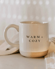 Cream glazed ceramic mug by Sweet Water Decor, perfect for warm beverages, in a cozy kitchen and dining setting.