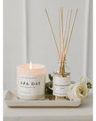 Sweet Water Decor clear glass reed diffuser for relaxation, with reed sticks and calming scent visible in the image.