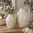 Tarn Neutral Glazed Jug medium and large styled on a rustic console with olive branches and neutral ceramics