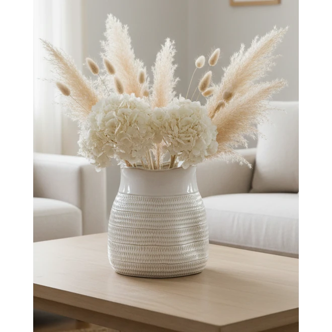 White ceramic vase with a textured surface and wide neck from Hill Interiors, designed for decorative floral arrangements.