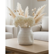 White ceramic vase with a textured surface and wide neck from Hill Interiors, designed for decorative floral arrangements.