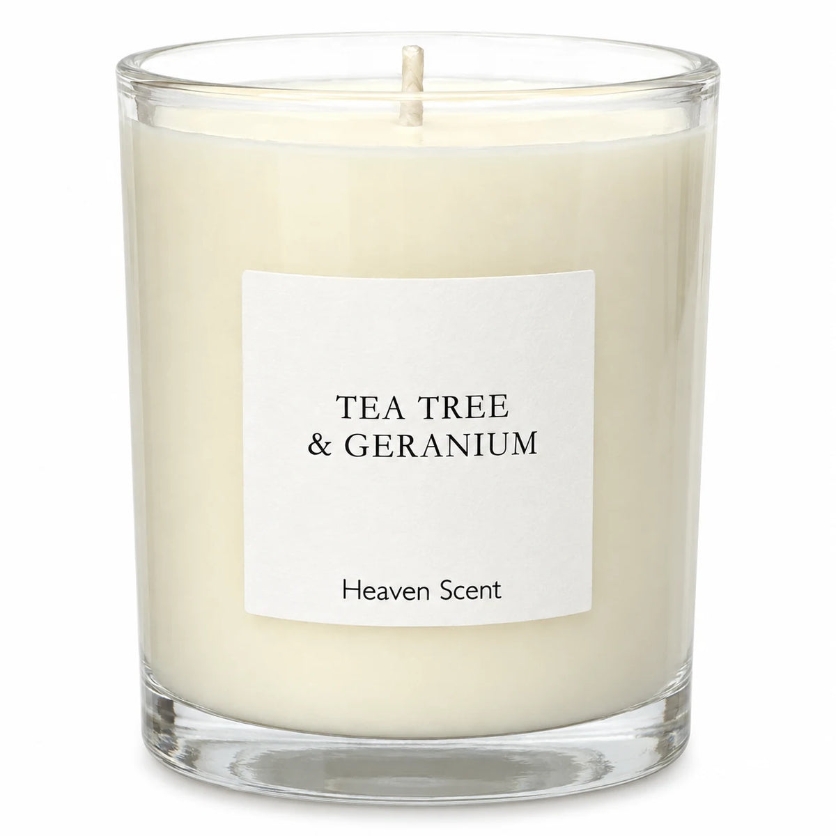 Heaven Scent Tea Tree And Geranium Medium Candle, close-up of the fragrance label and clear glass