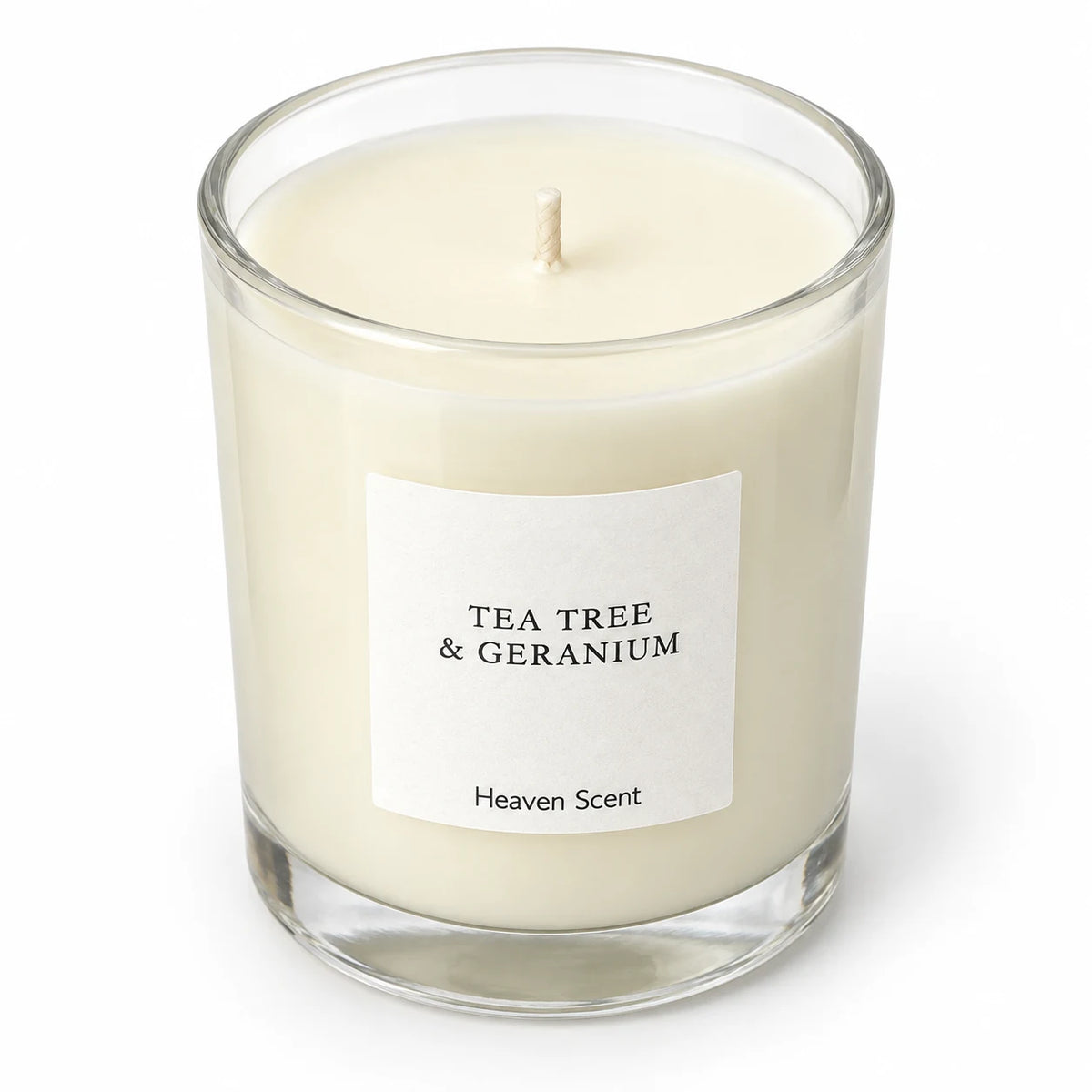 Heaven Scent Tea Tree And Geranium Medium Candle, close-up of cream wax and the unlit wick