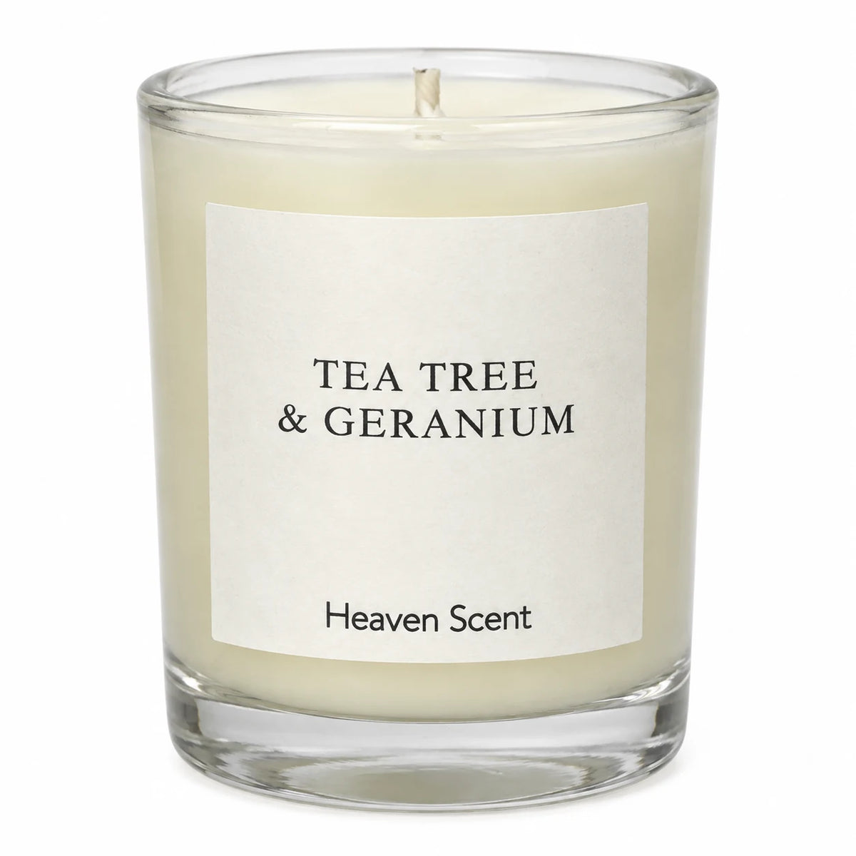 Heaven Scent Tea Tree And Geranium Small Candle, close-up of the fragrance label and clear glass