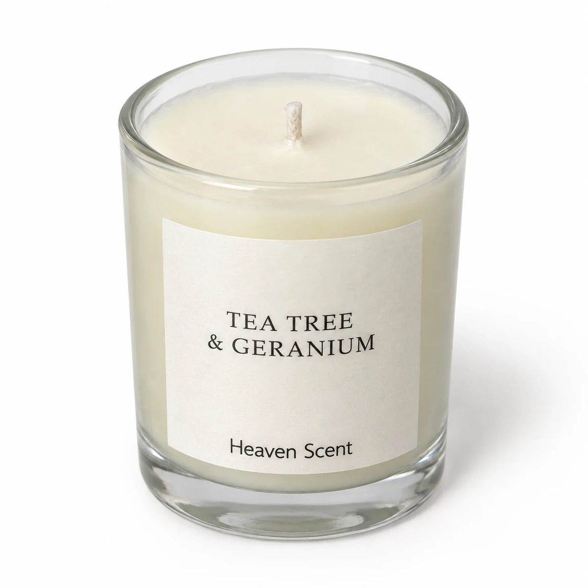 Heaven Scent Tea Tree And Geranium Small Candle, close-up of cream wax and the unlit wick
