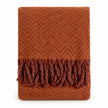 Tweedie cinnamon brushed herringbone throw folded with fringe on a white background