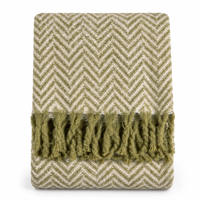 Tweedie green brushed herringbone throw folded with fringe on a white background