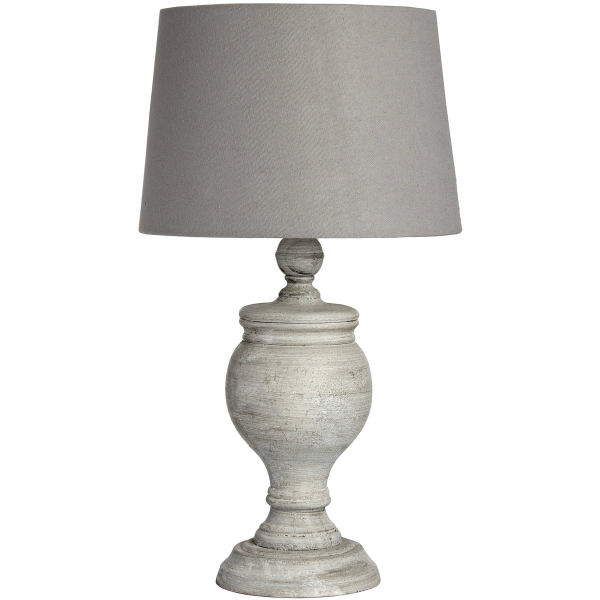 Uthina wooden table lamp by Hill Interiors featuring a sleek, natural wood finish and modern lighting design on a table surface.