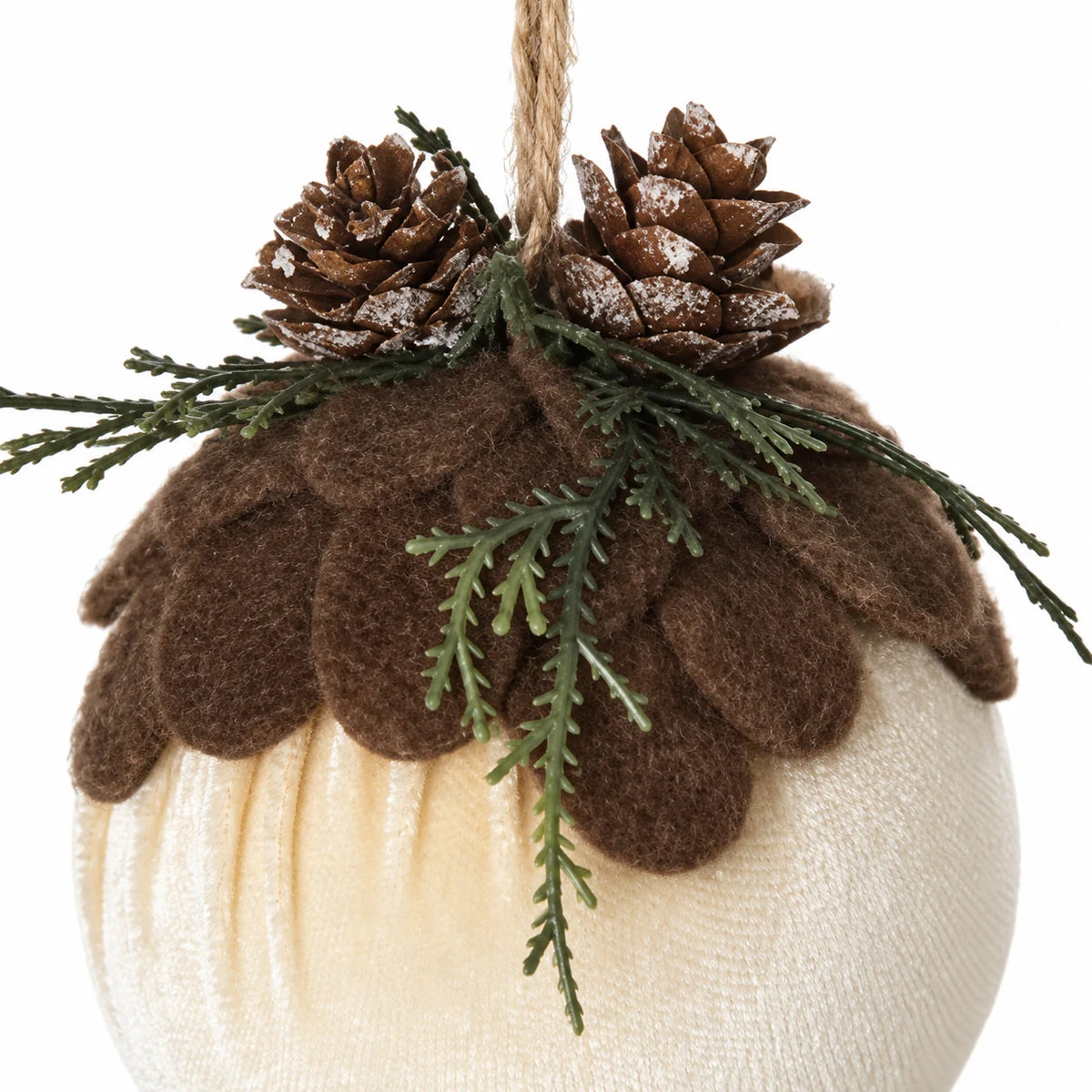 Close-up of cream variant velvet and brown scalloped felt cap on Velvet Bauble With Woodland Pinecone Decor.