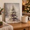 Vintage Christmas Tree canvas board on a side table beside a mug of tea