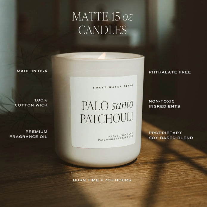 Sweet Water Decor 15 oz matte candle feature graphic, illustrated with a lit Palo Santo Patchouli candle on wood.