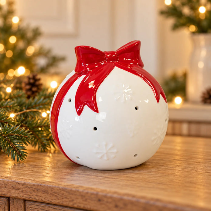 Satchville white Christmas bauble with red bow ornament