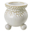 White bobble-footed candle holder with green decorative glaze