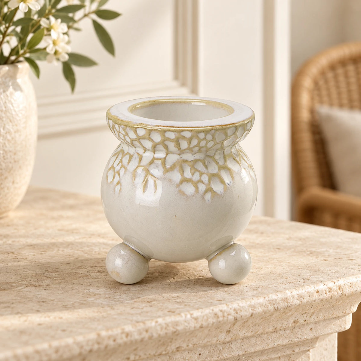 White Bobble Candle Holder — Empty holder on pale stone mantel