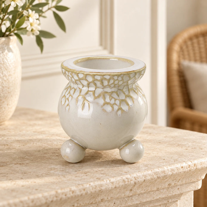 White Bobble Candle Holder — Empty holder on pale stone mantel