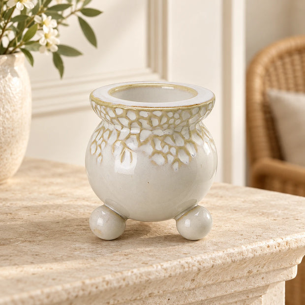 White Bobble Candle Holder — Empty holder on pale stone mantel