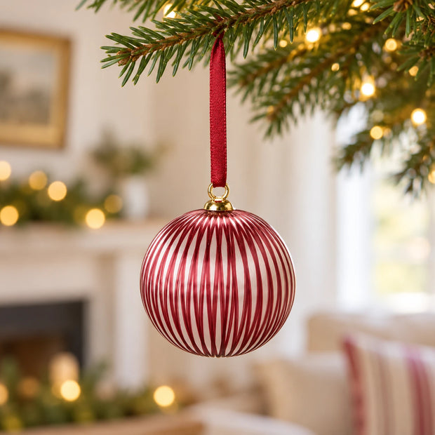 White & Burgundy Christmas Hanging Baubles — Only narrow-stripe bauble hanging on one fir branch