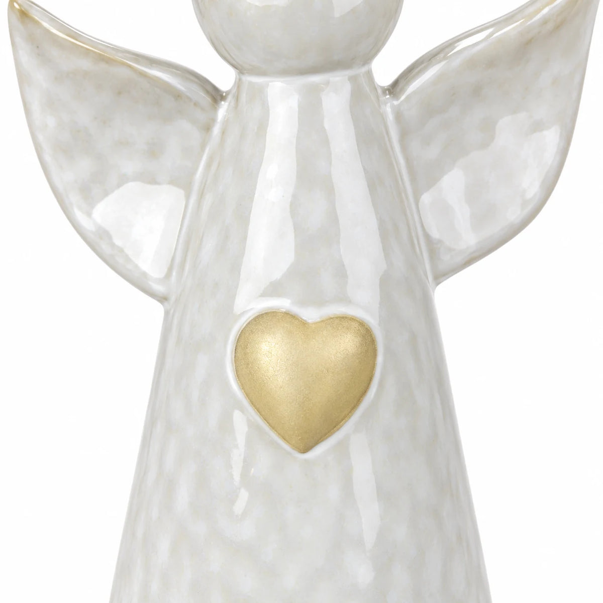White studio close-up of the pale gold heart detail and glossy pearly glaze on the ceramic angel ornament.