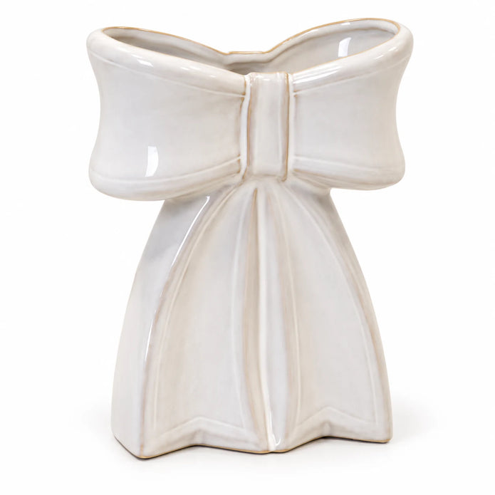 White ceramic bow vase showing sculpted loops, centre knot and glossy glaze on white