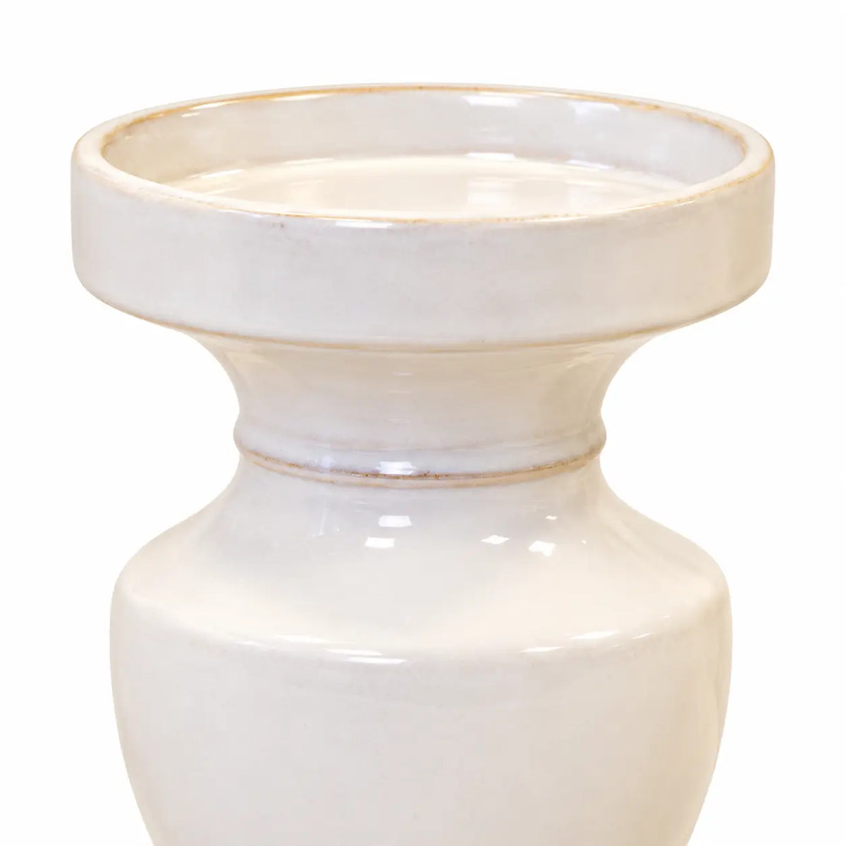Close-up of the candle holder's shallow dish, collar and glossy white glaze
