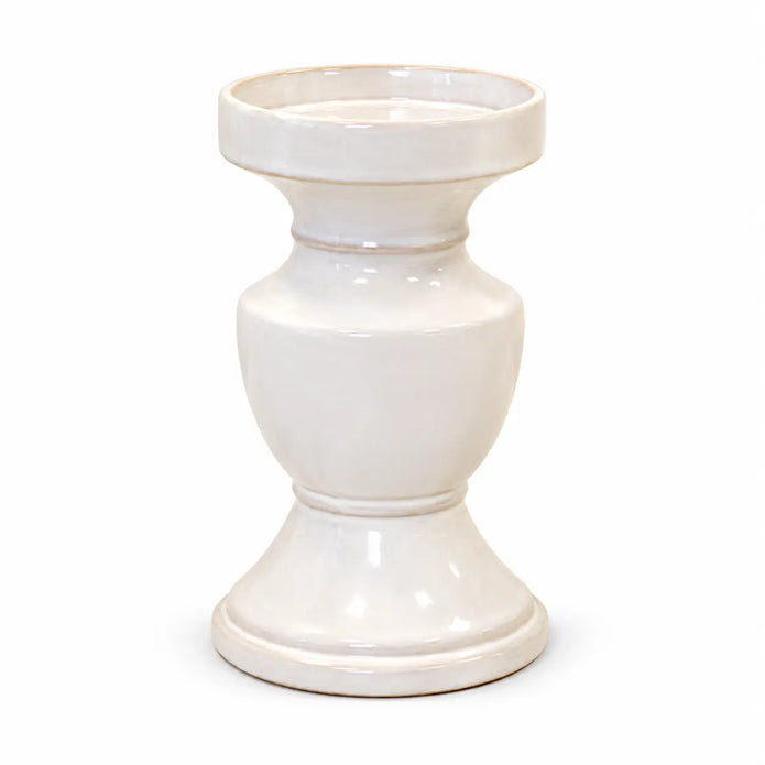 Full large white ceramic candle holder isolated on a white studio background