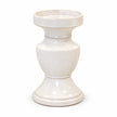 Full large white ceramic candle holder isolated on a white studio background