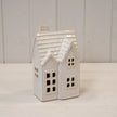 Medium glazed ceramic tiled LED house, complete product view on a white background