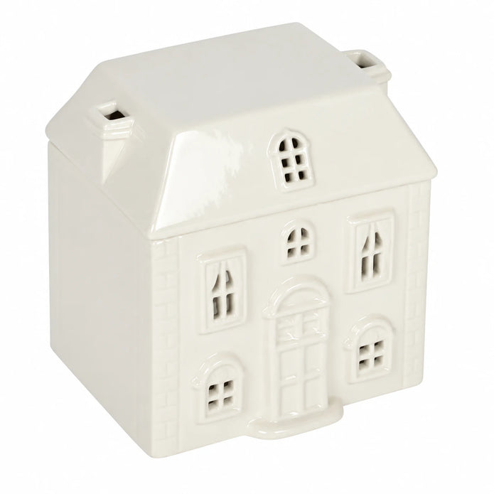 White Ceramic House Wax Melt Oil Burner, three-quarter view of the cream-white house and removable roof against white.