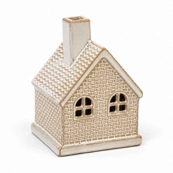 White ceramic LED light-up Christmas cottage by Satchville, featuring a cozy white holiday scene with illuminated windows.