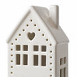 White ceramic Christmas light-up LED house with heart detail by Gainsborough Giftware x Portland Living