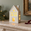 White ceramic LED light-up Christmas house with heart by Gainsborough Giftware x Portland Living