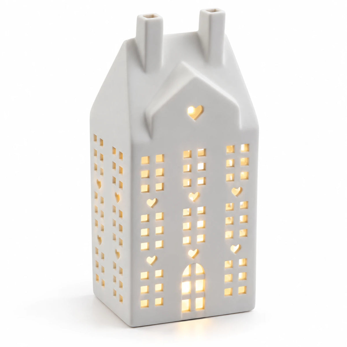 White ceramic matte LED Christmas house by Sifcon, illuminated from within, designed as a festive holiday decorative light.