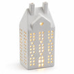 White ceramic matte LED Christmas house by Sifcon, illuminated from within, designed as a festive holiday decorative light.