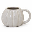 White ceramic pumpkin mug with autumn glaze detail from Satchville, perfect for fall-themed beverages.
