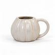 White ceramic pumpkin mug for autumn, featuring a smooth finish and festive pumpkin design by Satchville.