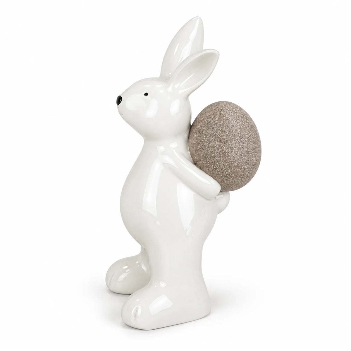 Large white ceramic rabbit holding a taupe egg, 21cm tall, complete ornament on a white studio background.