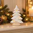 Satchville small white ceramic Christmas tree tealight candle holder on a mantel