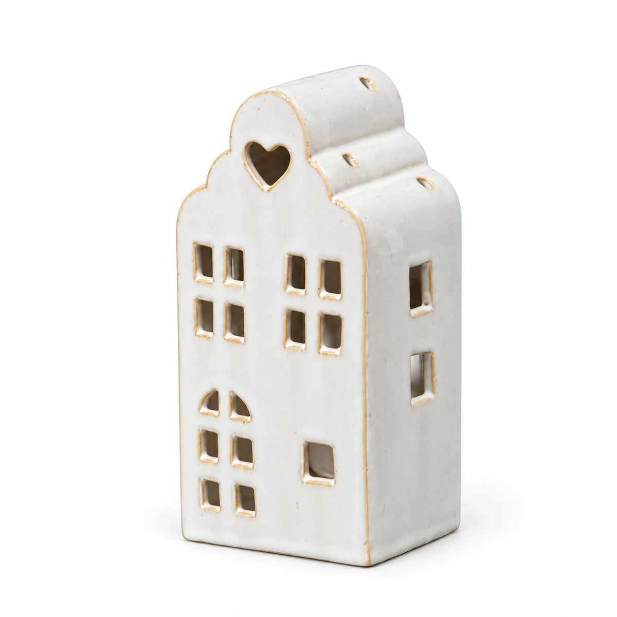 Complete empty white ceramic house tealight holder with stepped roof on white