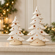 Satchville small white ceramic Christmas tree tealight candle holder beside larger size