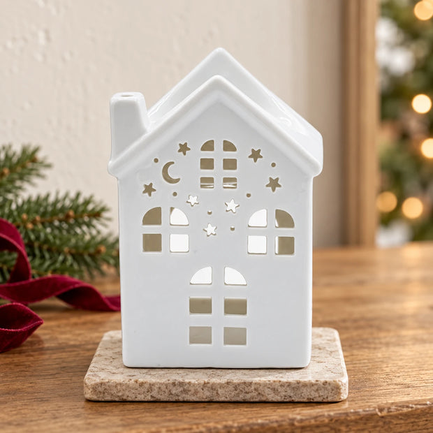 Ancient Wisdom White House oil wax melt burner with Christmas-themed design