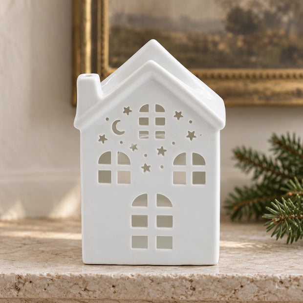 Ancient Wisdom White House oil wax melt burner displayed on a Christmas mantel décor setting