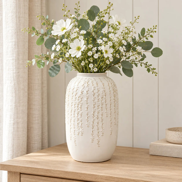 Large warm white ceramic leaf vase, 29cm tall, styled with white flowers and eucalyptus on a pale oak console.