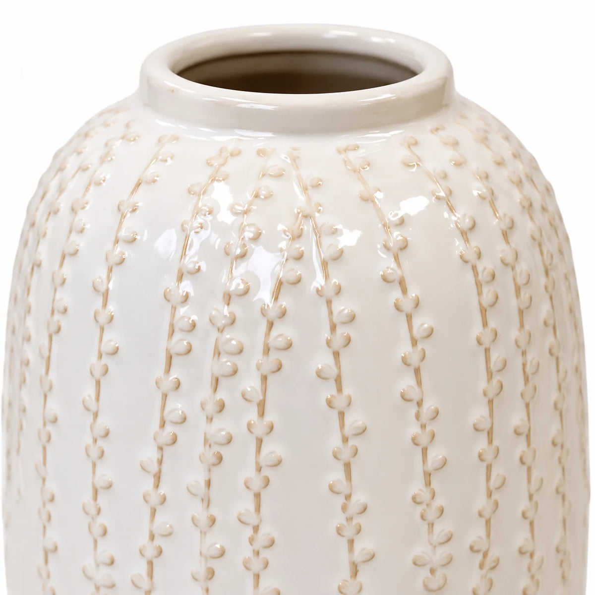 Medium warm white ceramic leaf vase, 24cm tall, close-up of the glazed trailing leaf detail on white.